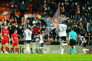 2022-01-19 - Goncalo Guedes of Valencia celebrates a goal during the Spanish championship La Liga football match between Valencia CF and Sevilla FC on January 19, 2022 at the Mestalla Stadium in Valencia, Spain - VALENCIA CF VS SEVILLA FC - SPANISH LA LIGA - SOCCER