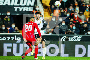 2022-01-19 - Goncalo Guedes of Valencia and Diego Carlos of Sevilla FC during the Spanish championship La Liga football match between Valencia CF and Sevilla FC on January 19, 2022 at the Mestalla Stadium in Valencia, Spain - VALENCIA CF VS SEVILLA FC - SPANISH LA LIGA - SOCCER