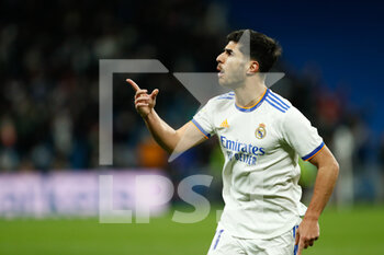 2022-02-19 - Marco Asensio of Real Madrid celebrates a goal 1-0 during the Spanish championship La Liga football match between Real Madrid and Deportivo Alaves on February 19, 2022 at Santiago Bernabeu stadium in Madrid, Spain - REAL MADRID VS DEPORTIVO ALAVES - SPANISH LA LIGA - SOCCER