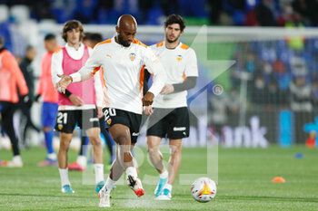 2022-03-12 - Dimitri Foulquier of Valencia warms up during the Spanish championship La Liga football match between Getafe CF and Valencia CF on March 12, 2022 at Coliseum Alfonso Perez stadium in Getafe, Madrid, Spain - GETAFE CF VS VALENCIA CF - SPANISH LA LIGA - SOCCER