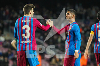 2022-03-13 - Ferran Torres of FC Barcelona celebrates a goal with Gerard Pique during the Spanish championship La Liga football match between FC Barcelona and CA Osasuna on March 13, 2022 at Camp Nou stadium in Barcelona, Spain - FC BARCELONA VS CA OSASUNA - SPANISH LA LIGA - SOCCER