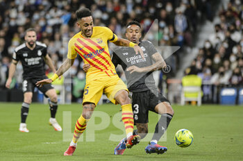 2022-03-20 - 20.03.2022, Madrid, Pierre-Emerick Aubameyang of Fc Barcelona (L) battles for the ball with Eder Militao of Real Madrid CF (R )during the La Liga match between Real Madrid and FC Barcelona at Estadio Santiago Bernabeu on 20 March 2022 in Madrid Spain. - REAL MADRID VS FC BARCELONA - SPANISH LA LIGA - SOCCER