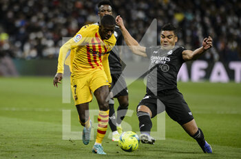 2022-03-20 - 20.03.2022, Madrid, Ousmane Dembele of Fc Barcelona (L) battles for the ball with Carlos Casemiro of Real Madrid CF (R) during the La Liga match between Real Madrid and FC Barcelona at Estadio Santiago Bernabeu on 20 March 2022 in Madrid Spain. - REAL MADRID VS FC BARCELONA - SPANISH LA LIGA - SOCCER