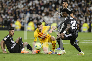 2022-03-20 - 20.03.2022, Madrid, Eric Garcia of Fc Barcelona (C) battles for the ball with Rodrygo Goes of Real Madrid CF (L) Vinicius Junior of Real Madrid CF (R) during the La Liga match between Real Madrid and FC Barcelona at Estadio Santiago Bernabeu on 20 March 2022 in Madrid Spain. - REAL MADRID VS FC BARCELONA - SPANISH LA LIGA - SOCCER