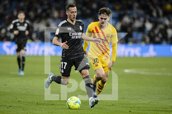 2022-03-20 - 20.03.2022, Madrid, Lucas Vazquez of Real Madrid CF (L) is chased by Gavi Martin of Fc Barcelona (R) during the La Liga match between Real Madrid and FC Barcelona at Estadio Santiago Bernabeu on 20 March 2022 in Madrid Spain. - REAL MADRID VS FC BARCELONA - SPANISH LA LIGA - SOCCER