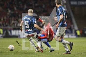 2022-04-02 - 02.04.2022, Madrid, Spain. Joao Felix of Atletico de Madrid (R) battles for the ball with Victor Laguardia (L) during the Liga Santander match between Atletico de Madrid and Deportivo Alaves at Estadio Wanda Metropolitano on 02 April 2022 in Madrid Spain. - ATLETICO DE MADRID VS DEPORTIVO ALAVES - SPANISH LA LIGA - SOCCER