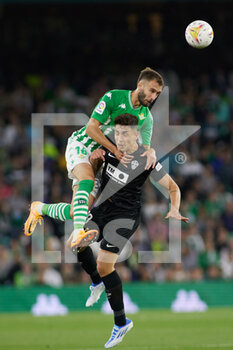 2022-04-19 - German Pezzella of Real Betis and Ezequiel Ponce of Elche CF during the Spanish championship La Liga football match between Real Betis and Elche CF on April 19, 2022 at Benito Villamarin stadium in Sevilla, Spain - REAL BETIS VS ELCHE CF - SPANISH LA LIGA - SOCCER