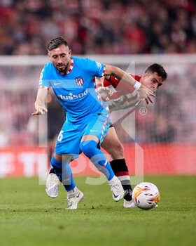 2022-04-30 - Hector Carrera of Atletico de Madrid competes for the ball with Dani Garcia of Athletic Club during the Spanish championship La Liga football match between Athletic Club and Atletico de Madrid on April 30, 2022 at San Mames stadium in Bilbao, Spain - ATHLETIC CLUB VS ATLETICO DE MADRID - SPANISH LA LIGA - SOCCER