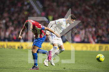 2022-05-08 - 30.04.2022, Madrid, Spain. Federico Valverde of Real Madrid CF (R) battles for the ball with Jorge Resurreccion koke of Atletico de Madrid (L) during the LaLiga Santander match between Atletico de Madrid and Real Madrid at Wanda Metropolitano on 8 May 2022 in Madrid, Spain. - ATLETICO DE MADRID VS REAL MADRID - SPANISH LA LIGA - SOCCER