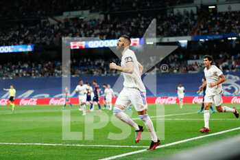 2022-05-12 - Karim Benzema of Real Madrid celebrates a goal during the Spanish championship La Liga football match between Real Madrid and Levante UD on May 12, 2022 at Santiago Bernabeu stadium in Madrid, Spain - REAL MADRID VS LEVANTE UD - SPANISH LA LIGA - SOCCER