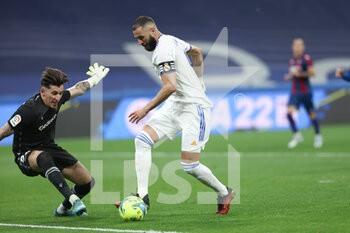 2022-05-12 - Karim Benzema of Real Madrid and Daniel Cardenas of Levante during the Spanish championship La Liga football match between Real Madrid and Levante UD on May 12, 2022 at Santiago Bernabeu stadium in Madrid, Spain - REAL MADRID VS LEVANTE UD - SPANISH LA LIGA - SOCCER