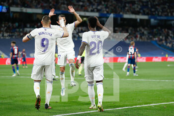 2022-05-12 - Vinicius Junior of Real Madrid celebrates a goal with Karim Benzema during the Spanish championship La Liga football match between Real Madrid and Levante UD on May 12, 2022 at Santiago Bernabeu stadium in Madrid, Spain - REAL MADRID VS LEVANTE UD - SPANISH LA LIGA - SOCCER