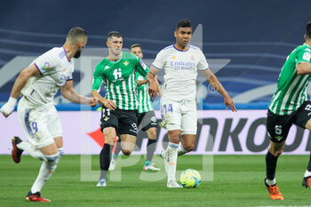 2022-05-20 - Guido Rodriguez of Real Betis and Carlos Henrique Casemiro of Real Madrid during the Spanish championship La Liga football match between Real Madrid and Real Betis Balompie on May 20, 2022 at Santiago Bernabeu stadium in Madrid, Spain - REAL MADRID VS REAL BETIS BALOMPIE - SPANISH LA LIGA - SOCCER