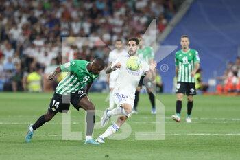 2022-05-20 - William Carvalho of Real Betis and Francisco "Isco" Alarcon of Real Madrid during the Spanish championship La Liga football match between Real Madrid and Real Betis Balompie on May 20, 2022 at Santiago Bernabeu stadium in Madrid, Spain - REAL MADRID VS REAL BETIS BALOMPIE - SPANISH LA LIGA - SOCCER