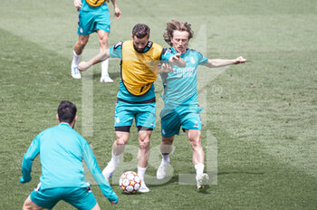 2022-05-24 - 24.05.2022, Madrid, Spain. Nacho Fenandez of Real Madrid CF (L) battles for the ball with Luka Modric of Real Madrid CF (R) during open media day Real Madrid at Ciudad deportiva Real Madrid on 24 Mal 2022 in Madrid Spain. - OPEN MEDIA DAY REAL MADRID - SPANISH LA LIGA - SOCCER