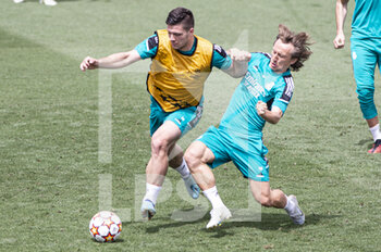 2022-05-24 - 24.05.2022, Madrid, Spain. Luka Jovic of Real Madrid CF (L) battles for the ball with Luka Modric of Real Madrid CF (R) during open media day Real Madrid at Ciudad deportiva Real Madrid on 24 Mal 2022 in Madrid Spain. - OPEN MEDIA DAY REAL MADRID - SPANISH LA LIGA - SOCCER