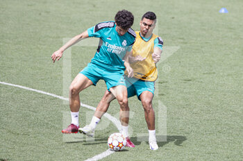 2022-05-24 - 24.05.2022, Madrid, Spain. Carlos Casemiro of Real Madrid CF (L) battles for the ball with Jesus Vallejo of Real Madrid CF (R)  during open media day Real Madrid at Ciudad deportiva Real Madrid on 24 Mal 2022 in Madrid Spain. - OPEN MEDIA DAY REAL MADRID - SPANISH LA LIGA - SOCCER