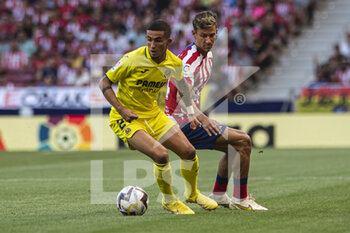 2022-08-21 - 21.08.2022, Madrid, Yeremi Pino of Villarreal CF (L) is chased by Marcos Llorente of Atletico de Madrid (R) Spain. during the LaLiga Santander match between Atletico de Madrid and Villarreal CF at Wanda Metropolitano on 22 August 2022 in Madrid, Spain. - LALIGA SANTANDER 2022/2023 - ATLETICO DE MADRID VS VILLARREAL CF - SPANISH LA LIGA - SOCCER