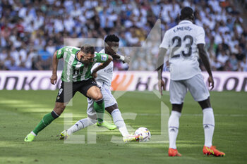 2022-09-03 - 03.09.2022, Madrid, Spain. Vinicius Junior of Real Madrid CF (L) battles for the ball with Borja Iglesias of Real Betis (R) during the LaLiga Santander match between Real Madrid CF and Real Betis at Santiago Bernabeu on 3 September 2022 in Madrid, Spain. - LALIGA SANTANDER 2021/2023- REAL MADRID VS REAL BETIS - SPANISH LA LIGA - SOCCER