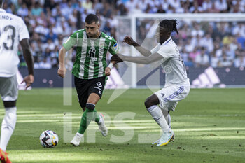 2022-09-03 - 03.09.2022, Madrid, Spain. Guido Rodriguez of Real Betis (C) battles for the ball with Ferland Mendy of Real Madrid CF (L) and Eduardo Camavinga of Real Madrid CF (R) during the LaLiga Santander match between Real Madrid CF and Real Betis at Santiago Bernabeu on 3 September 2022 in Madrid, Spain. - LALIGA SANTANDER 2021/2023- REAL MADRID VS REAL BETIS - SPANISH LA LIGA - SOCCER