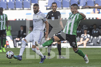 2022-09-03 - 03.09.2022, Madrid, Spain. Karim Benzema of Real Madrid CF (L) being defended by Guido Rodriguez of Real Betis (R) during the LaLiga Santander match between Real Madrid CF and Real Betis at Santiago Bernabeu on 3 September 2022 in Madrid, Spain. - LALIGA SANTANDER 2021/2023- REAL MADRID VS REAL BETIS - SPANISH LA LIGA - SOCCER