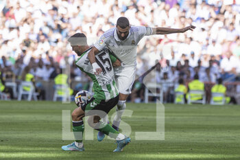 2022-09-03 - 03.09.2022, Madrid, Spain. Karim Benzema of Real Madrid CF (R) battles for the ball with Alex Moreno of Real Betis (L) during the LaLiga Santander match between Real Madrid CF and Real Betis at Santiago Bernabeu on 3 September 2022 in Madrid, Spain. - LALIGA SANTANDER 2021/2023- REAL MADRID VS REAL BETIS - SPANISH LA LIGA - SOCCER