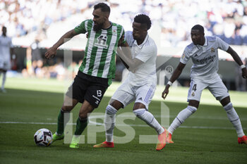 2022-09-03 - Borja Iglesias of Real Betis (L) and Eder Militao of Real Madrid CF (L) during the Spanish championship La Liga football match between Real Madrid and Real Betis on September 3, 2022 at Santiago Bernabeu stadium in Madrid, Spain - FOOTBALL - SPANISH CHAMP - REAL MADRID V REAL BETIS - SPANISH LA LIGA - SOCCER