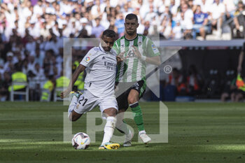 2022-09-03 - Rodrygo Goes of Real Madrid CF (R) and Guido Rodriguez of Real Betis (R) during the Spanish championship La Liga football match between Real Madrid and Real Betis on September 3, 2022 at Santiago Bernabeu stadium in Madrid, Spain - FOOTBALL - SPANISH CHAMP - REAL MADRID V REAL BETIS - SPANISH LA LIGA - SOCCER