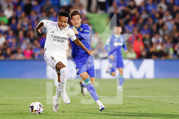 2022-10-08 - Eder Militao of Real Madrid and Luis Milla of Getafe during the Spanish championship La Liga football match between Getafe CF and Real Madrid on October 8, 2022 at Coliseum Alfonso Perez stadium in Getafe, Madrid, Spain - FOOTBALL - SPANISH CHAMP - GETAFE V REAL MADRID - SPANISH LA LIGA - SOCCER
