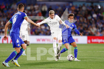 2022-10-08 - Federico Valverde of Real Madrid and Luis Milla of Getafe during the Spanish championship La Liga football match between Getafe CF and Real Madrid on October 8, 2022 at Coliseum Alfonso Perez stadium in Getafe, Madrid, Spain - FOOTBALL - SPANISH CHAMP - GETAFE V REAL MADRID - SPANISH LA LIGA - SOCCER