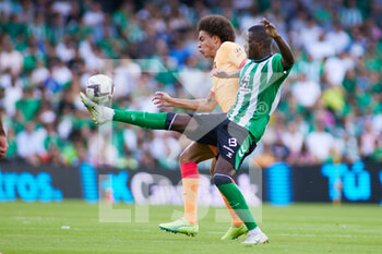 2022-10-23 - Axel Witsel of Atletico de Madrid and William Carvalho of Real Betis during the Spanish championship La Liga football match between Real Betis and Atletico de Madrid on October 23, 2022 at Benito Villamarin stadium in Sevilla, Spain - FOOTBALL - SPANISH CHAMP - REAL BETIS V ATLETICO MADRID - SPANISH LA LIGA - SOCCER