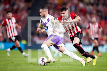 2022-11-08 - Ivan Sanchez of Real Valladolid CF competes for the ball with Jon Morcillo of Athletic Club during the Spanish championship La Liga football match between Athletic Club and Real Valladolid CF on November 8, 2022 at San Mames stadium in Bilbao, Spain - FOOTBALL - SPANISH CHAMP - ATHLETIC CLUB V REAL VALLADOLID - SPANISH LA LIGA - SOCCER
