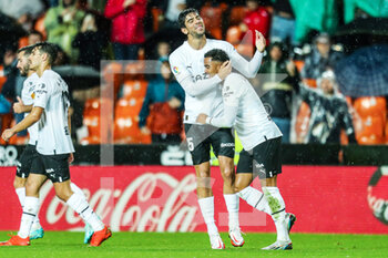 2022-11-10 - Justin Kluivert of Valencia celebrates a goal 3-0 with Cenk Ozkacar during the Spanish championship La Liga football match between Valencia CF and Real Betis Balompie on november 10, 2022 at Mestalla stadium in Valencia, Spain - FOOTBALL - SPANISH CHAMP - VALENCIA V REAL BETIS - SPANISH LA LIGA - SOCCER