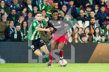 2022-12-29 - Alex Moreno of Real Betis and Nico Williams of Athletic Club during the Spanish championship La Liga football match between Real Betis and Athletic Club on December 29, 2022 at Benito Villamarin stadium in Sevilla, Spain - FOOTBALL - SPANISH CHAMP - REAL BETIS V ATHLETIC CLUB - SPANISH LA LIGA - SOCCER