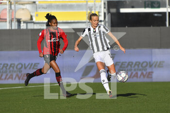 2022-01-08 - Matilde Lundorf Skovsen  of Juventus Women and Lindsey Kimberley Thomas of A.C. Milan during the Women's Italian Supercup Final between F.C. Juventus and A.C. Milan at the Benito Stirpe Stadium on 8th of January, 2022 in Frosinone, Italy. - FINAL - JUVENTUS WOMEN VS AC MILAN - WOMEN SUPERCOPPA - SOCCER