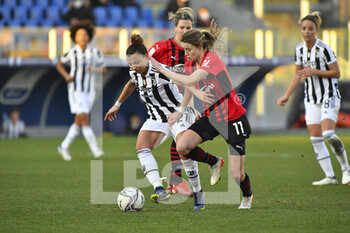 2022-01-08 - Arianna Caruso of Juventus Women and Christy Grimshaw of A.C. Milan during the Women's Italian Supercup Final between F.C. Juventus and A.C. Milan at the Benito Stirpe Stadium on 8th of January, 2022 in Frosinone, Italy. - FINAL - JUVENTUS WOMEN VS AC MILAN - WOMEN SUPERCOPPA - SOCCER