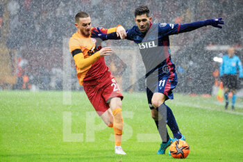 2022-01-23 - Victor Nelsson of Galatasaray, Anastasios Bakasetas of Trabzonspor during the Turkish championship Super Lig football match between Galatasaray and Trabzonspor on January 23, 2022 at Nef Stadyumu in Istanbul, Turkey - GALATASARAY VS TRABZONSPOR - TURKISH SUPER LEAGUE - SOCCER
