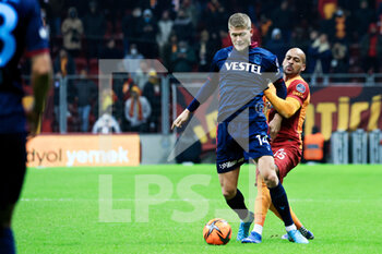 2022-01-23 - Andreas Cornelius of Trabzonspor, Marcao of Galatasaray during the Turkish championship Super Lig football match between Galatasaray and Trabzonspor on January 23, 2022 at Nef Stadyumu in Istanbul, Turkey - GALATASARAY VS TRABZONSPOR - TURKISH SUPER LEAGUE - SOCCER