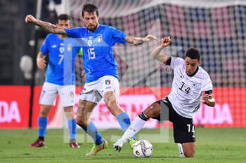 2022-06-04 - Francesco Acerbi (Italy) and Jamal Musiala (Germany) - ITALY VS GERMANY - UEFA NATIONS LEAGUE - SOCCER