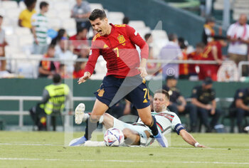 2022-06-02 - Alvaro Morata of Spain and Joao Moutinho of Portugal during the UEFA Nations League, League A - Group A2 football match between Spain and Portugal on June 2, 2022 at Benito Villamarin stadium in Sevilla, Spain - FOOTBALL - NATIONS LEAGUE - SPAIN V PORTUGAL - UEFA NATIONS LEAGUE - SOCCER