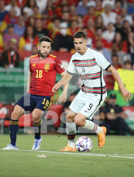 2022-06-02 - Andre Silva of Portugal and Jordi Alba of Spain during the UEFA Nations League, League A - Group A2 football match between Spain and Portugal on June 2, 2022 at Benito Villamarin stadium in Sevilla, Spain - FOOTBALL - NATIONS LEAGUE - SPAIN V PORTUGAL - UEFA NATIONS LEAGUE - SOCCER