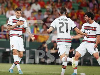 2022-06-02 - Ricardo Horta of Portugal celebrates a goal with Joao Cancelo, Goncalo Guedes 1-1 during the UEFA Nations League, League A - Group A2 football match between Spain and Portugal on June 2, 2022 at Benito Villamarin stadium in Sevilla, Spain - FOOTBALL - NATIONS LEAGUE - SPAIN V PORTUGAL - UEFA NATIONS LEAGUE - SOCCER