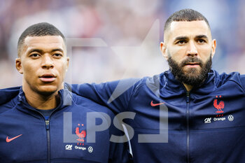 2022-06-03 - Kylian MBAPPE of France and Karim BENZEMA of France during the UEFA Nations League, League A - Group 1 football match between France and Denmark on June 3, 2022 at Stade de France in Saint-Denis near Paris, France - FOOTBALL - NATIONS LEAGUE - FRANCE V DENMARK - UEFA NATIONS LEAGUE - SOCCER