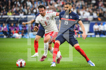 2022-06-03 - Thomas DELANEY of Denmark and Karim BENZEMA of France during the UEFA Nations League, League A - Group 1 football match between France and Denmark on June 3, 2022 at Stade de France in Saint-Denis near Paris, France - FOOTBALL - NATIONS LEAGUE - FRANCE V DENMARK - UEFA NATIONS LEAGUE - SOCCER