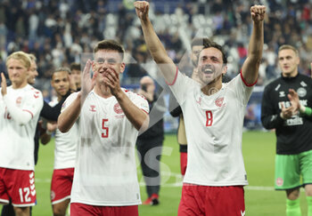 2022-06-03 - Joakim Maehle, Thomas Delaney of Denmark celebrate the victory following the UEFA Nations League League A - Group 1 football match between France and Denmark on June 3, 2022 at Stade de France in Saint-Denis near Paris, France - FOOTBALL - NATIONS LEAGUE - FRANCE V DENMARK - UEFA NATIONS LEAGUE - SOCCER
