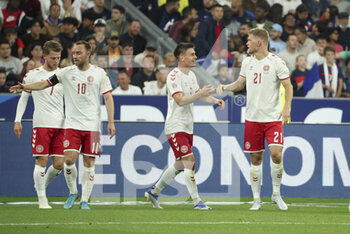 2022-06-03 - Andreas Cornelius of Denmark #21 celebrates his second goal with teammates during the UEFA Nations League League A - Group 1 football match between France and Denmark on June 3, 2022 at Stade de France in Saint-Denis near Paris, France - FOOTBALL - NATIONS LEAGUE - FRANCE V DENMARK - UEFA NATIONS LEAGUE - SOCCER