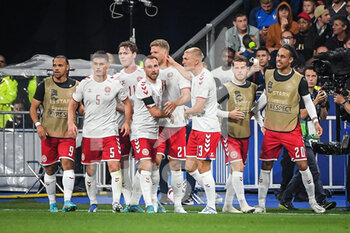 2022-06-03 - Andreas CORNELIUS of Denmark celebrate his goal with teammates during the UEFA Nations League, League A - Group 1 football match between France and Denmark on June 3, 2022 at Stade de France in Saint-Denis near Paris, France - FOOTBALL - NATIONS LEAGUE - FRANCE V DENMARK - UEFA NATIONS LEAGUE - SOCCER