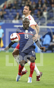 2022-06-03 - N'Golo Kante of France, Thomas Delaney of Denmark during the UEFA Nations League League A - Group 1 football match between France and Denmark on June 3, 2022 at Stade de France in Saint-Denis near Paris, France - FOOTBALL - NATIONS LEAGUE - FRANCE V DENMARK - UEFA NATIONS LEAGUE - SOCCER