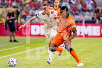 2022-06-03 - Timothy Castagne of Belgium, Denzel Dumfries of the Netherlands during the UEFA Nations League 2022, League A Group 4 football match between Belgium and Netherlands on June 3, 2022 at the King Baudouin Stadium in Brussels, Belgium - FOOTBALL - NATIONS LEAGUE 2022 - BELGIUM V NETHERLANDS - UEFA NATIONS LEAGUE - SOCCER