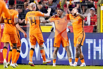 2022-06-03 - Memphis Depay of the Netherlands celebrates with his team mates after scoring his sides second goal during the UEFA Nations League 2022, League A Group 4 football match between Belgium and Netherlands on June 3, 2022 at the King Baudouin Stadium in Brussels, Belgium - FOOTBALL - NATIONS LEAGUE 2022 - BELGIUM V NETHERLANDS - UEFA NATIONS LEAGUE - SOCCER